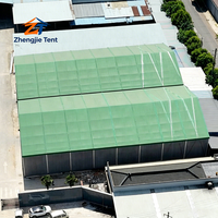 Tente de stockage industrielle robuste verte pour entrepôt, abri de grande capacité avec structure en aluminium, portable pour le stockage de matériaux en usine