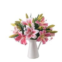 Vente en gros de fleurs de lys blanches et roses au toucher réel pour la maison, le mariage et la décoration de remise des diplômes