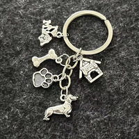 Porte-clés Vintage en Argent avec Empreinte de Patte et Os, Breloque Teckel, Cadeau pour Amoureux des Chiens et Propriétaires d'Animaux – Vente en Gros