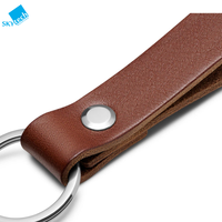 LLavero de piel auténtica clásico de diseño sencillo al por mayor, correa de mano con logotipo personalizado para regalo de promoción, producto artesanal de piel