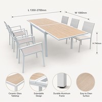 Table à manger extensible moderne pour l'extérieur avec structure en aluminium et plateau en verre céramique pour utilisation en cour