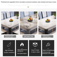 Nouvelle arrivée, table et chaises de salle à manger assemblées en bois blanc et gris, style moderne et luxueux, avec plateau en pierre frittée pour salle à manger