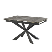 Table de restaurant contemporaine extensible avec pieds en métal croisés, plateau en pierre, table de salle à manger de luxe