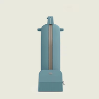 Machine à gaufres et à sandwichs électrique compacte bleue avec revêtement antiadhésif, boîtier rond en plastique, plateau à miettes amovible pour un usage domestique