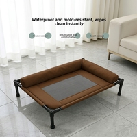 Lit surélevé pour chien en tissu Oxford durable et imperméable, avec cadre renforcé, faible MOQ, mobilier pour animaux de compagnie pour grands chiens, utilisation en salon