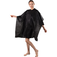 Cape jetable de coupe de cheveux pliable pour salon de coiffure Cape enveloppante de coiffure Capes de couverture en tissu protecteur de coupe de cheveux rasoir propre Apro