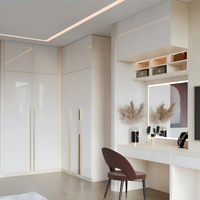 Armoire de chambre haut de gamme sur mesure, pliable et extensible, blanche brillante avec coiffeuse et éclairage LED pour maison moderne