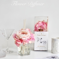 Diffuseur de parfum d'intérieur de luxe 250 ml en verre sans BPA avec fleurs artificielles, logo personnalisé, huile anti-moustiques longue durée