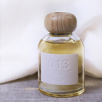 Bouteille de diffuseur d'huile essentielle ronde 150ml 200ml Bouteille de diffuseur de roseau vide de luxe sans feu avec bâtons et étiquette blanche