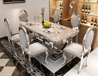 Ensemble de table à manger rectangulaire de luxe pour la salle à manger, avec plateau en marbre et base en acier inoxydable