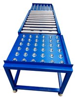 Ligne d'assemblage de convoyeurs à rouleaux à gravité automatisés industriels avec table de transfert de billes
