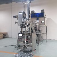 Machine d'emballage ultrasonique de sachet pyramidal de feuilles de thé de 1G 3G 5G Machine à emballer remplissante de sachet filtre de thé vert de fines herbes