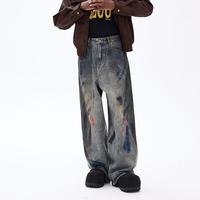 Pantalon en jean délavé tie-dye coloré à jambe large, style rétro graffiti fait main, inspiré de la mode urbaine américaine pour homme