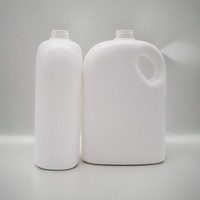 Bouteille de détergent à lessive en plastique 2L avec logo personnalisé avec poignée pour bouteille de liquide à lessive pour vêtements