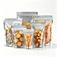 Op maat gemaakte voedselveilige gouden folie stand-up pouch met ritssluiting en venster voor snacks, koekjes, noten, gedroogd fruit, popcorn en voedselverpakkingen.