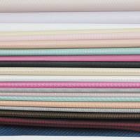 0.6mm d'épaisseur personnalisé plusieurs couleurs disponibles en cuir synthétique gaufré tricoté en PU pour chaussures