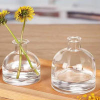 Diffuseur d'arômes en verre avec perles de bois volatiles florales pour parfumer la maison
