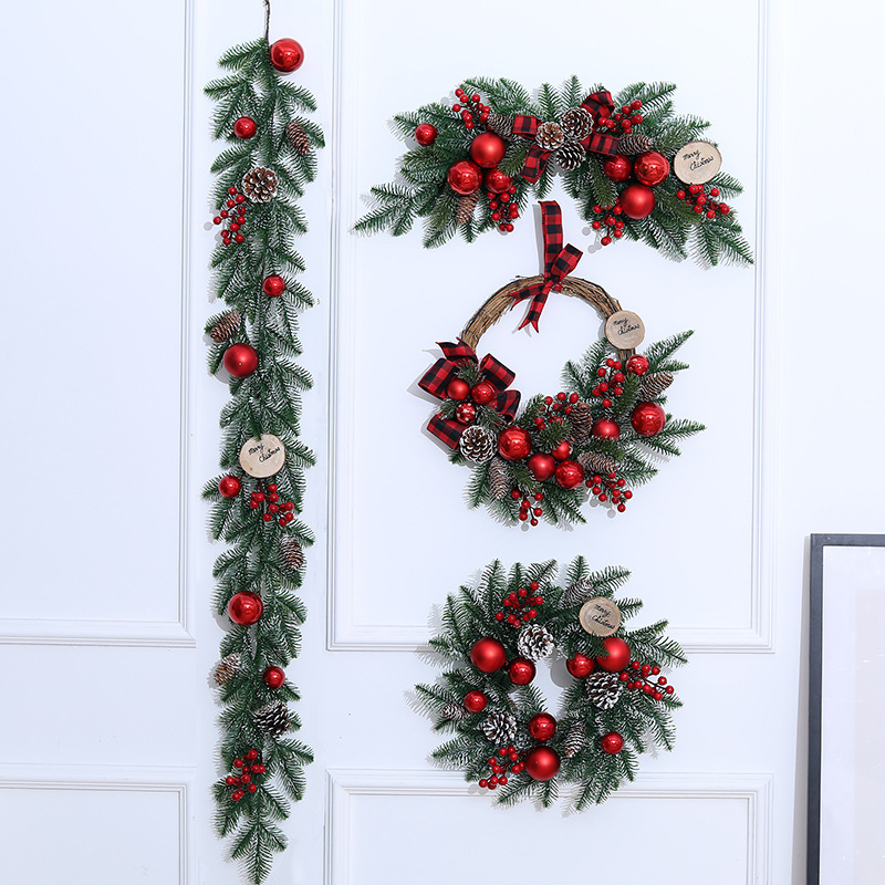 christmas garland with berries and pinecones