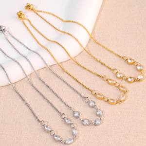 กำไลข้อมือสแตนเลสชุบทองทรงกลมประดับเพชรซิคอนรูปตัวยู - ดีไซน์แบบหลายเม็ดซิคอน ดีไซน์เชื่อมต่อหลากหลาย ใช้งานได้หลากหลาย เหมาะสำหรับงานปาร์ตี้ สวยสง่างาม - Product Image 1