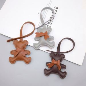 New <b>Cute</b> Cartoon <b>Bear</b> Backpack Keychain Popular PU Light Keychain with Pendant Bag Charm for Decorations - Product Image 1
