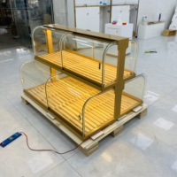 Bäckerei-Vitrinendesign aus Edelstahl mit Titanbeschichtung, Glas und LED-Beleuchtung, Hochleistungs-Gewerbeausstellungsvitrine für Einkaufszentren