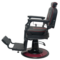 Sillón de Barbería Moderno con Costuras Rojas, Reposacabezas Ajustable y Marco Metálico Negro Decorativo para Salón de Belleza Masculino de Alta Gama