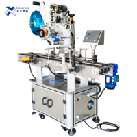 Machine d'étiquetage inviolable pour boîtes à clapet anti-effraction, emballages C-wrap, boîtes à fruits et légumes, bouteilles, bocaux et scellage des coins