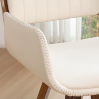 Fauteuil de salle à manger pivotant Brayven moderne en similicuir fait main avec pieds en bois, structure en bois massif écologique et structure en tube métallique