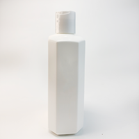 Bouteille en plastique blanche liquide, design hexagonal, corps durable, bouteille d'eau écologique, emballage de bouteille à capacité divisée