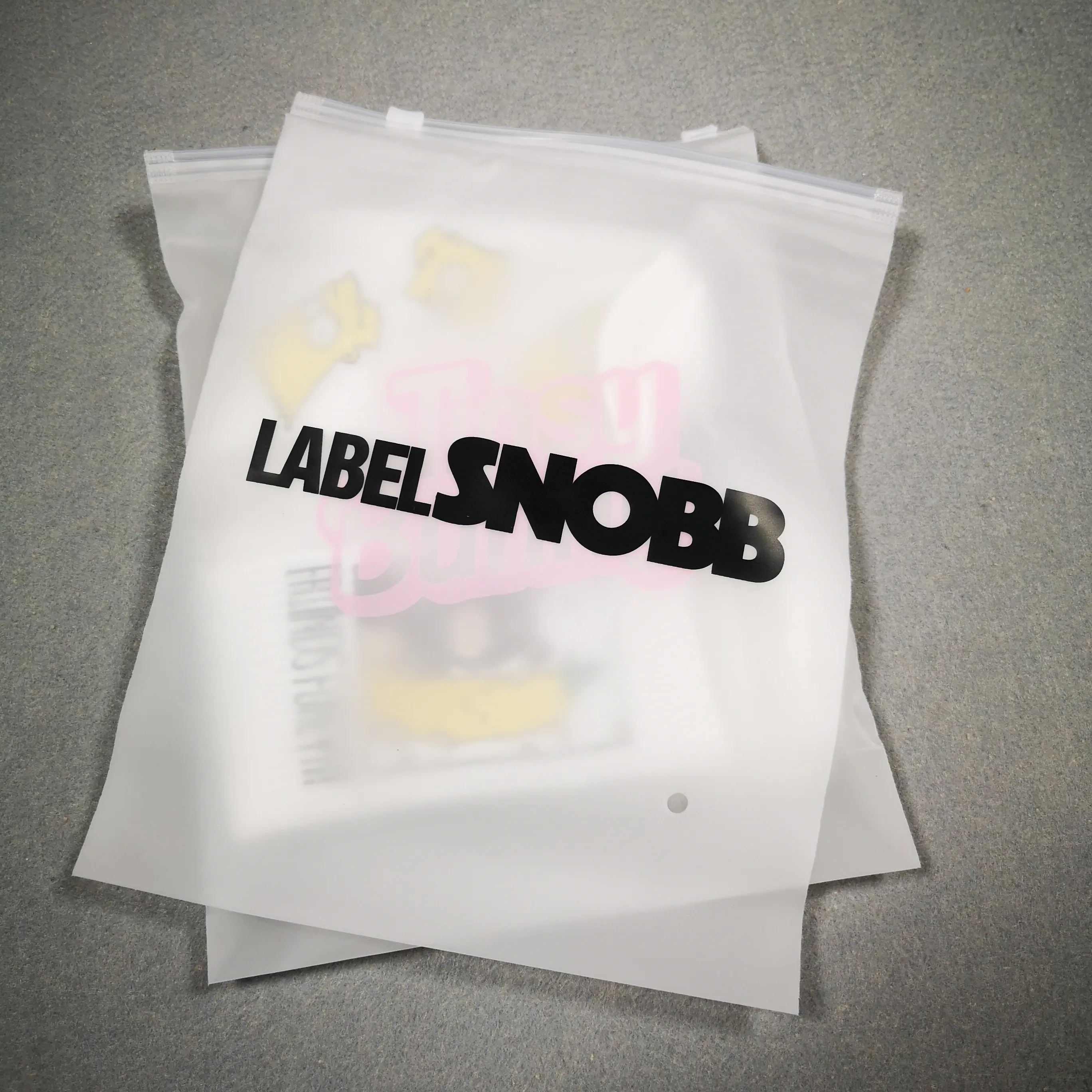 Roupas personalizadas com capuz, camisetas e calças, saco plástico selado biodegradável transparente com logotipo impresso