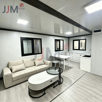 Maison conteneur extensible JJM 20 pieds, 2 chambres, modulaire préfabriquée avec système d'énergie solaire, utilisation hôtelière, design moderne, garantie 5 ans