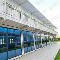 Maison conteneur préfabriquée modulaire FLKT prête pour l'énergie solaire, à économie d'énergie, type cabine, en kit plat