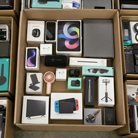 Boîte mystère électronique en stock excédentaire : Téléphone portable, clavier de jeu, écouteurs, caméra d'action pour les vendeurs e-commerce en gros