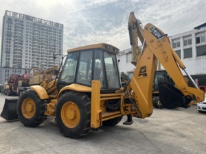 รถตักล้อยาง JCB รุ่น 4CX สีเหลือง มือสอง อุปกรณ์ก่อสร้าง น้ำหนักบรรทุก 9 ตัน เครื่องยนต์คัมมินส์ - Product Image 1