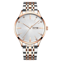 Mode boîtier rond Couple montre à Quartz hommes étanche lumière luxe avec diamant Simple montre Vintage