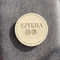 Étiquette en cuir gaufré de jeans de marque personnalisée pour vêtements