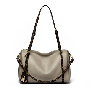 Sac à main portable et durable en PU pour femme, avec décoration en rivets, tendance. Sac à main luxueux de style Boston à motifs géométriques - Product Image 1