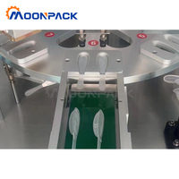 Machine de remplissage et de scellage rotative automatique Moonpack pour cuillères jetables en plastique de 15g, idéale pour le miel, la confiture, le sirop et la pâte