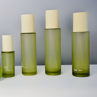 Individuell Gefärbtes Zylinder-Glasgefäß & Lotion-Flasche mit Holzmaserung-Deckel Umweltfreundlich Recycelbar 30/50g 100ml Fassungsvermögen Individuelles Logo