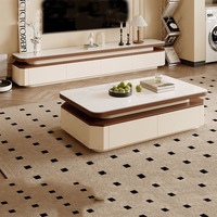 Table basse élégante bicolore avec plateau en pierre frittée et tiroirs à fermeture douce