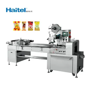 High speed pillow horizontal multi plum toffee milk chocolate sesame peanut hard cotton bear gummy candy packing machine