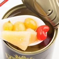 Cocktail de fruits confits en conserve en gros d'usine, en jus frais, fruits mélangés pelés et conservés pour desserts de boulangerie
