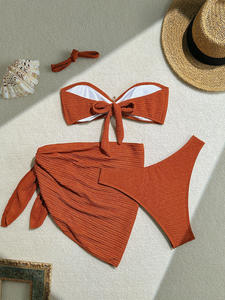 Nouveau 2026 Ensemble bikini 3 pièces sexy pour femme, couleur unie, comprenant un <span class=keywords><strong>haut</strong></span> <span class=keywords><strong>bustier</strong></span>, une jupe <span class=keywords><strong>de</strong></span> plage cache-<span class=keywords><strong>maillot</strong></span> et un <span class=keywords><strong>maillot</strong></span> <span class=keywords><strong>de</strong></span> <span class=keywords><strong>bain</strong></span> bikini à imprimé étoiles et dos nu - Product Image 1