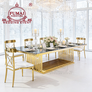 โต๊ะรับประทานอาหารกลางแจ้งทรงสี่เหลี่ยมผืนผ้ากระจก โมเดิร์น ยี่ห้อ Fumai รุ่น MG-205 โครงเหล็กกล้าไร้สนิมเคลือบทอง จาก Foshan Hotel Furniture - Product Image 3