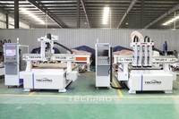 Routeur CNC 3 axes pour la découpe du bois avec changeur d'outils automatique (ATC) et table à vide pour la fabrication de meubles et d'armoires en bois