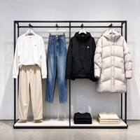 Porte-vêtements en métal noir, table ronde à niveaux, étagère grise, tringle de suspension, CE ETL, vente en gros, vente au détail, boutique