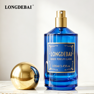 Flacon de <span class=keywords><strong>parfum</strong></span> en verre cylindrique haut de gamme 30ml 50ml 100ml bleu roi vide avec bouchon boule doré - Product Image 1