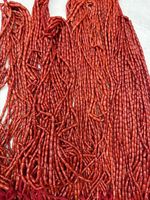 Perles de pierres précieuses de corail naturel en forme de riz rouge de sang de boeuf perles de pierres précieuses de corail italien naturel produit en vrac fait à la main