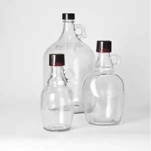 Vendita calda confezione vuota acqua alcool 1 gallone 128 once selce trasparente pistola impugnatura rotonda bottiglia di birra brocca di vetro