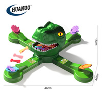 Jouet éducatif le classique TOMY Mr. Jeu de société pour la famille : Nourrissez la grenouille, jouets dinosaures